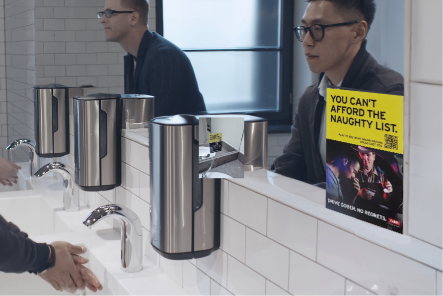 Promotional poster displayed on wall in office break room